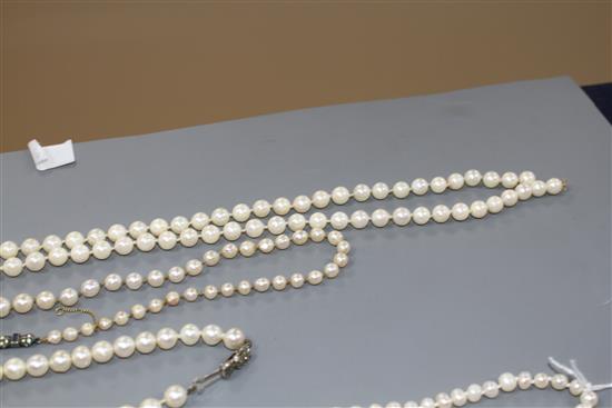 Seven assorted single strand cultured pearl necklaces, three with 925 clasps, two with 935 or 835 clasps and two others